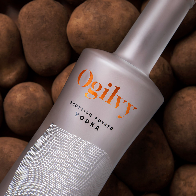 A bottle of Ogilvy Vodka on potatoes