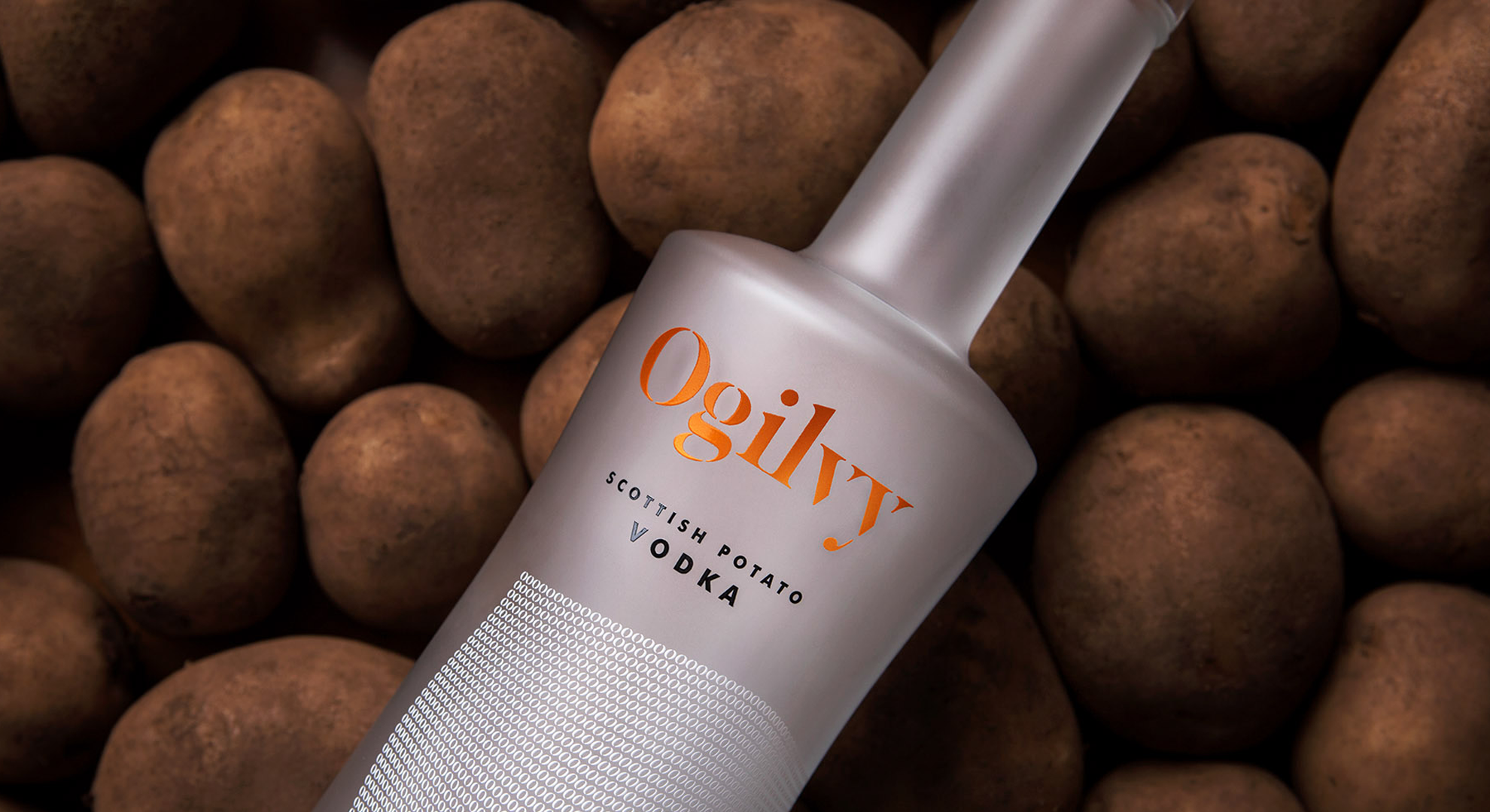 A bottle of Ogilvy Vodka on potatoes