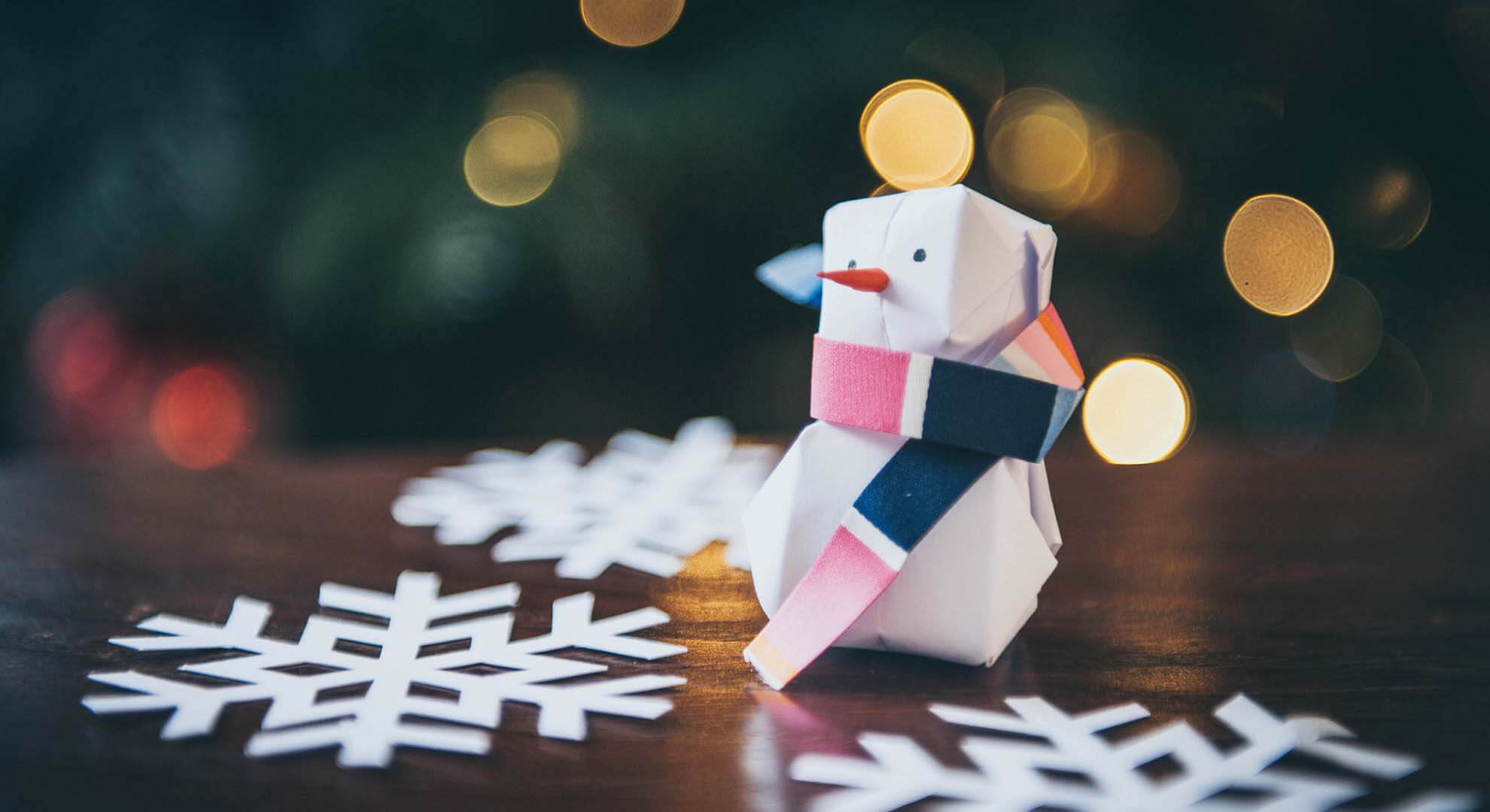 Paper snowman with paper snowflakes