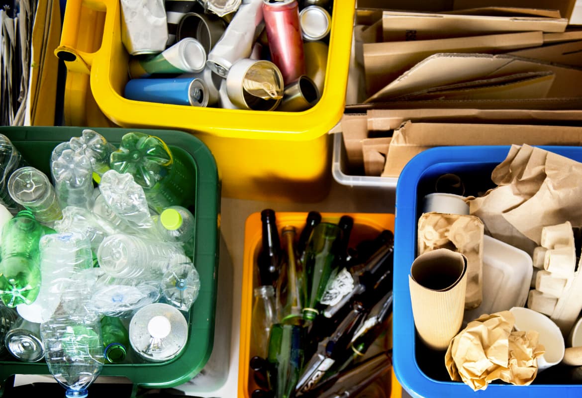 Mix collection of plastic, bottles, tines and paper for recycling