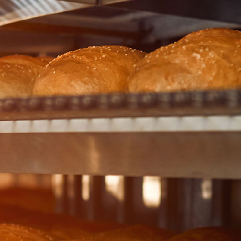 Bread baking in an industrial oven