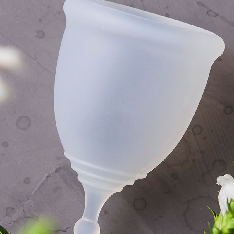A reusable menstrual moon cup sanitary product