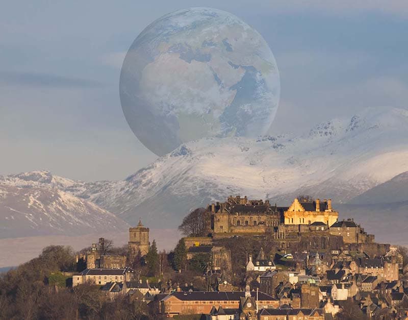 Image of Stirling Castle with another planet earth behind it