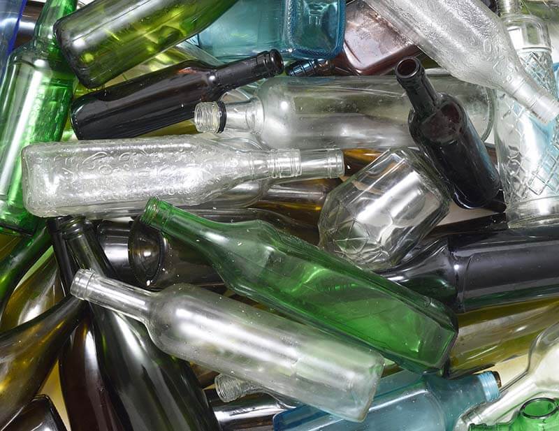 A variety of glass bottles ready to be recycled