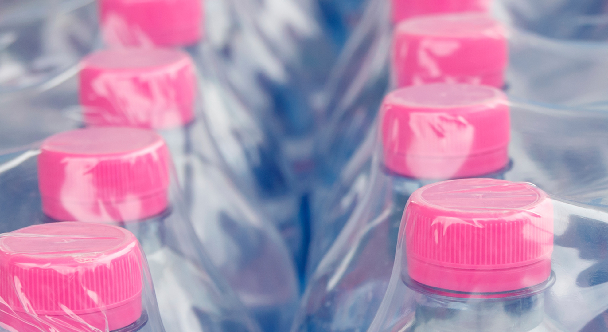 Plastic water bottles wrapped in plastic film