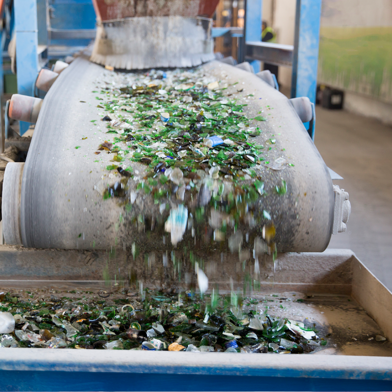 Glass on a conveyor belt in a processing plant
