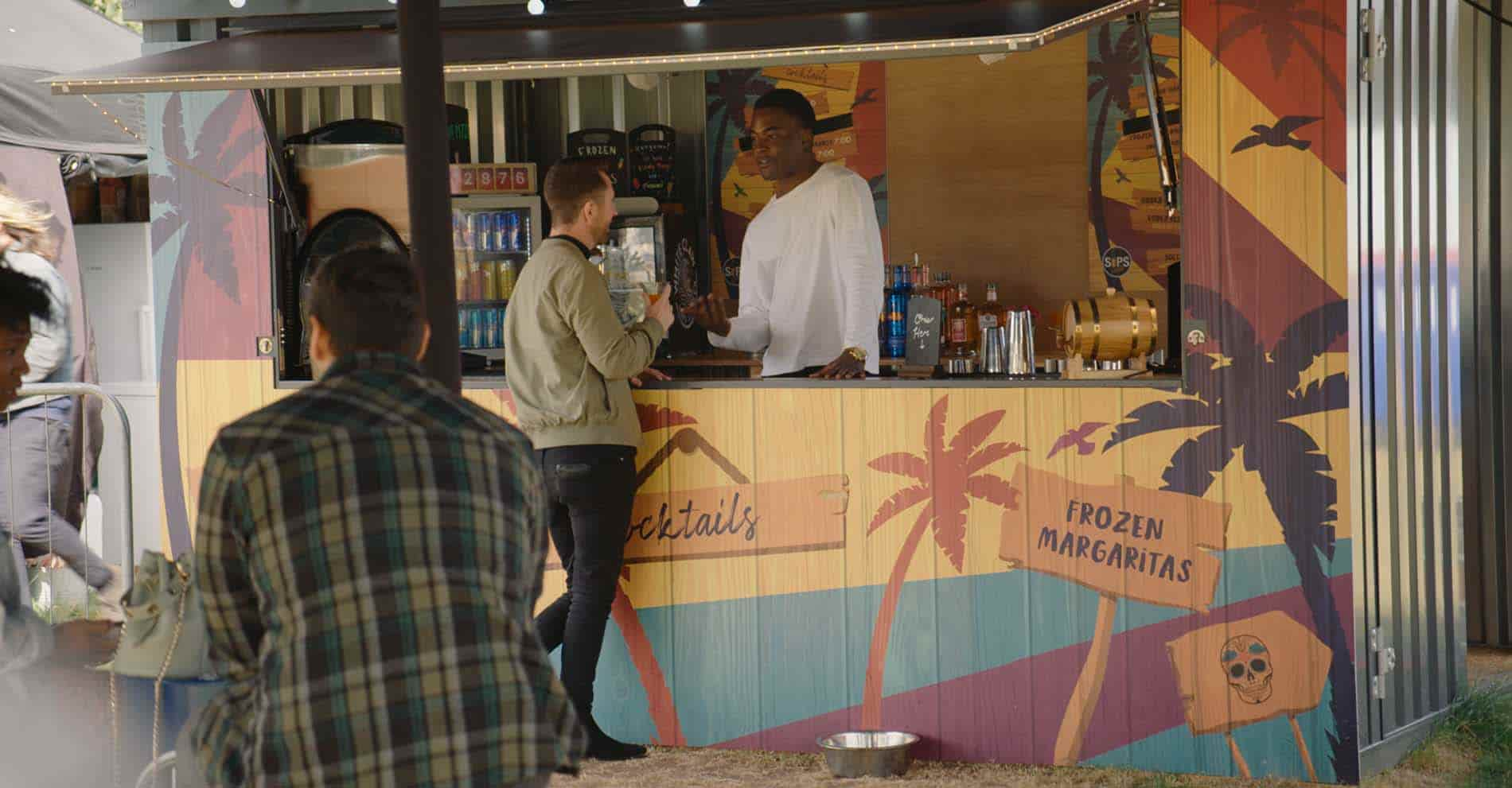 A bartender serving sustainable drinks