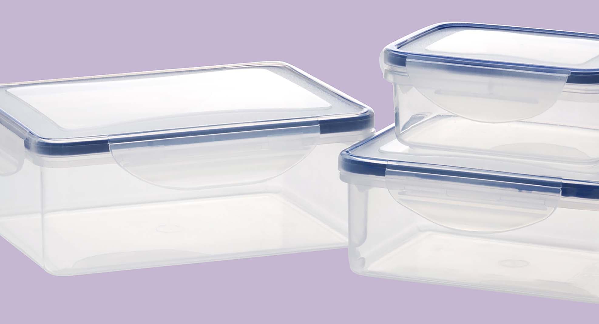 Reusable plastic containers on a purple background