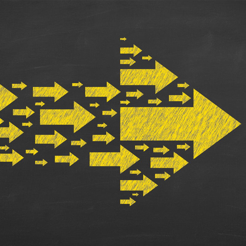 An illustration of little yellow arrows creating a large, single arrow pointing to the right