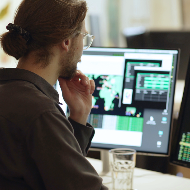 A person looking at data on a screen