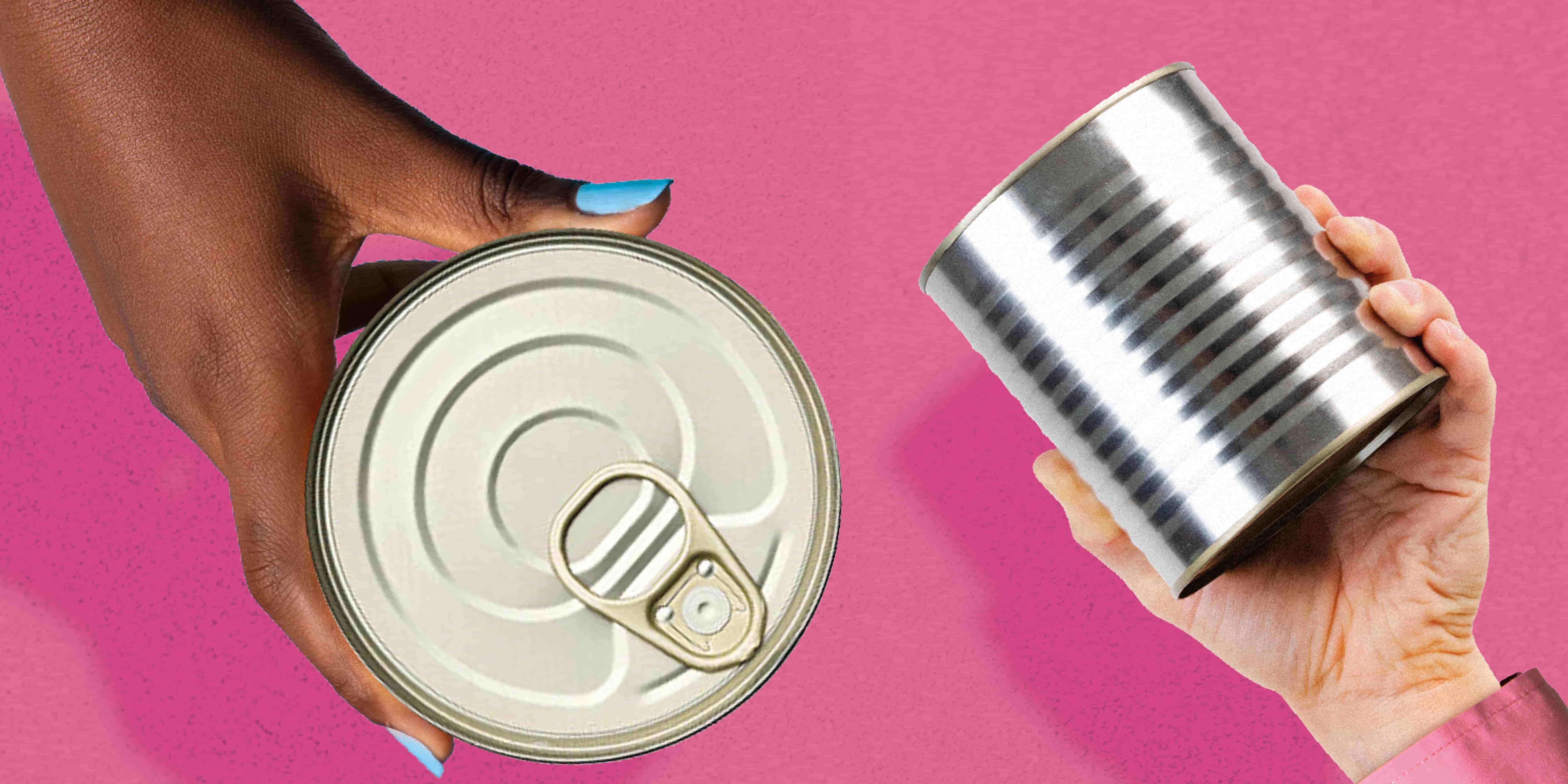 Hands holding canned products over a pink background