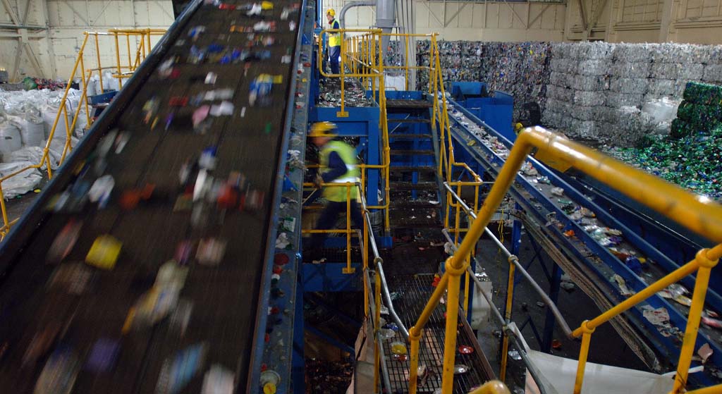 Photo of conveyor belts in a materials recovery facility