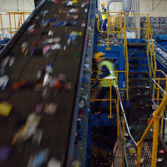 Photo of conveyor belts in a materials recovery facility