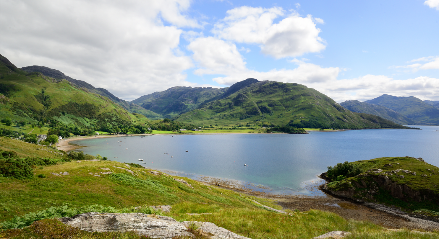 Scottish landscape - hills and loch, on a sunny day.