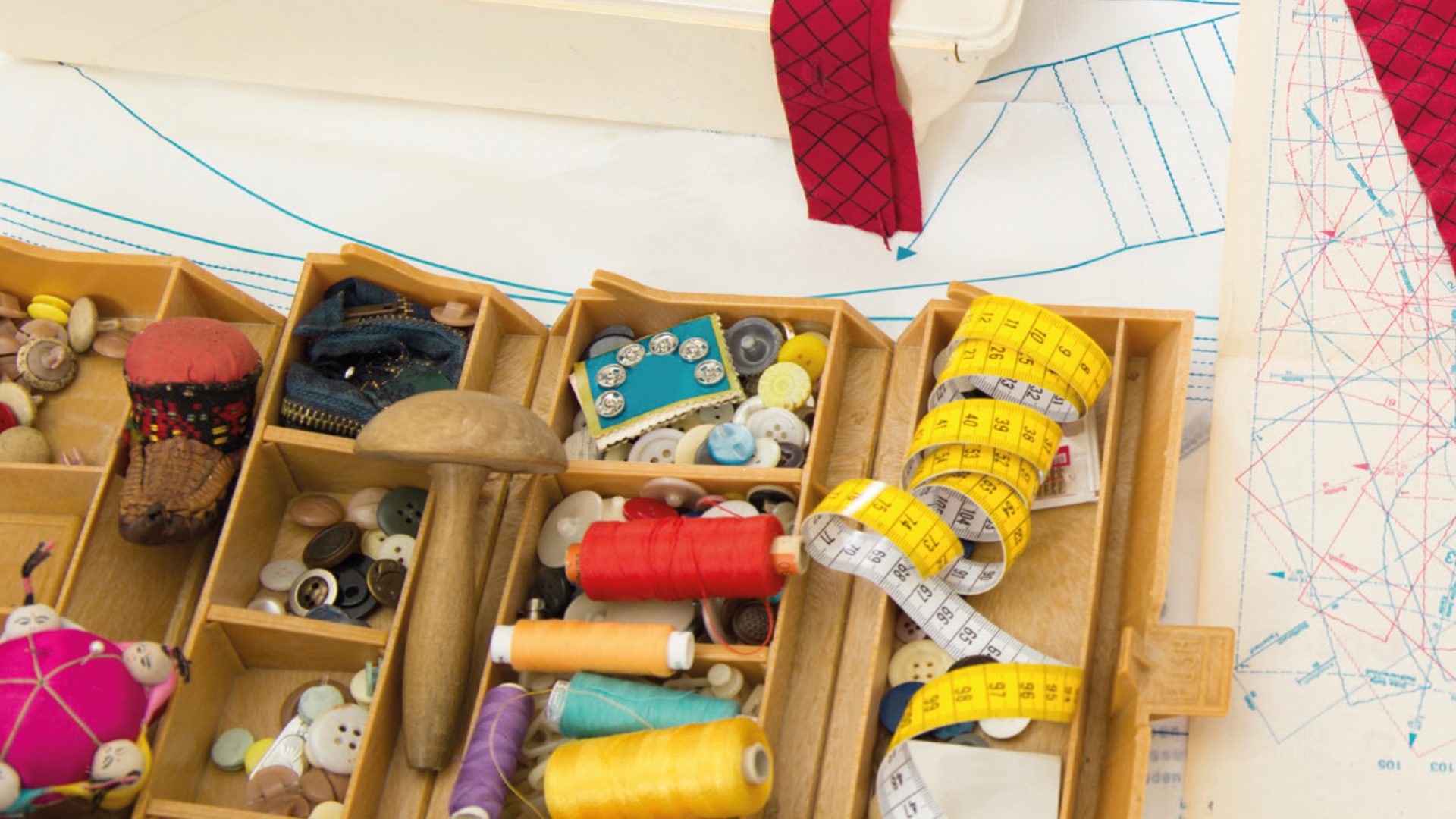 A variety of craft and repair tools on a table.