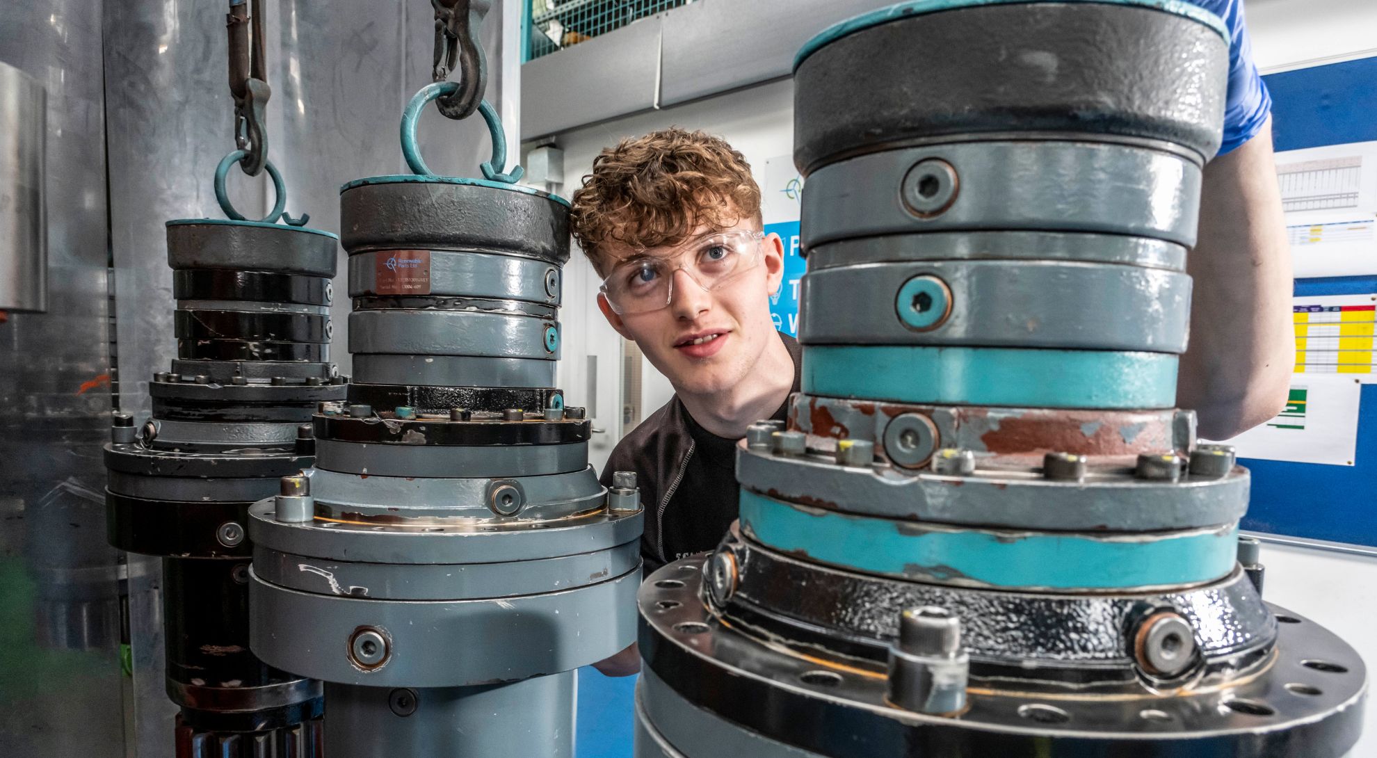 Worker at Renewable Parts operating machinery