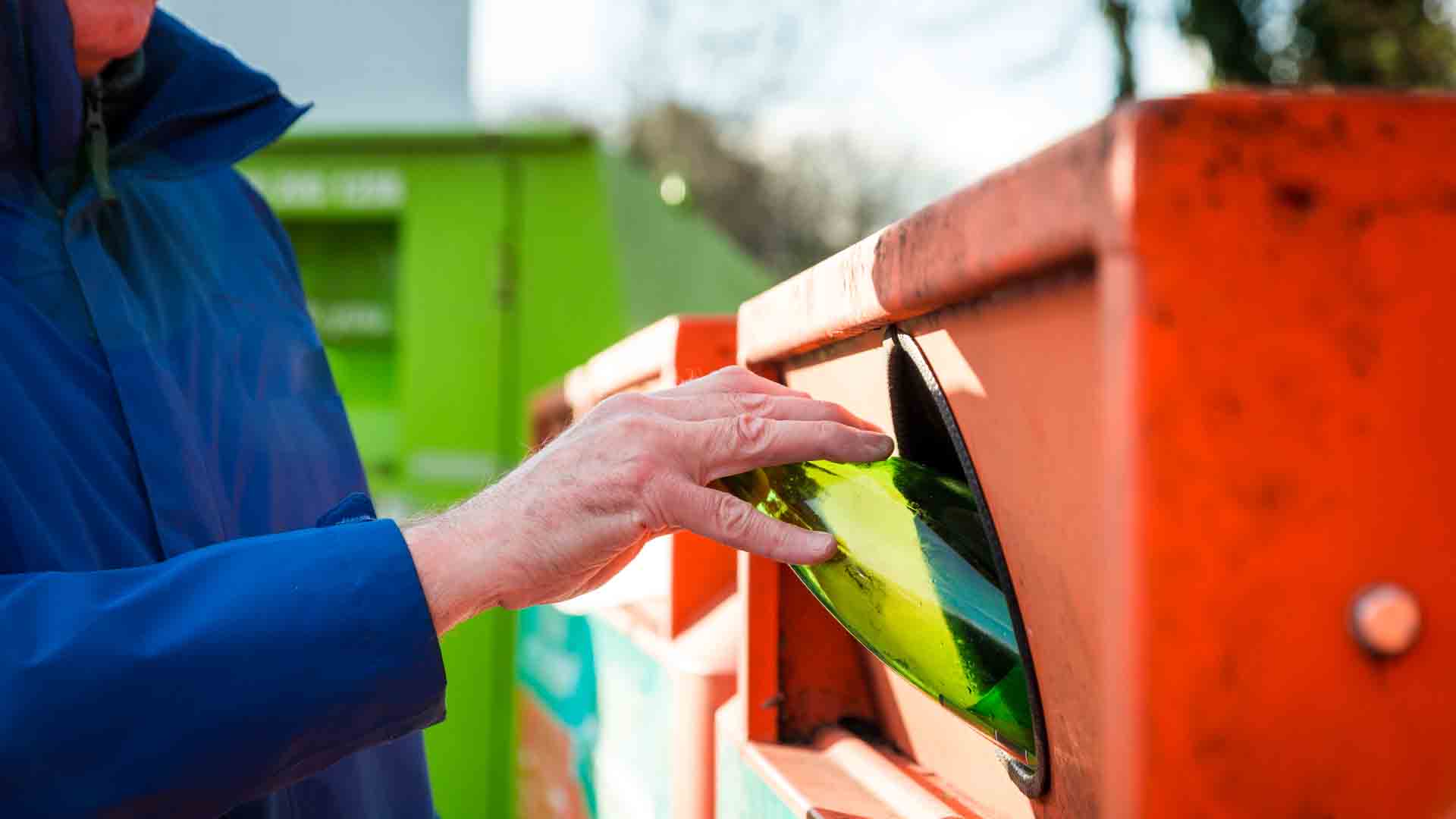 Photo of person recycling on the go
