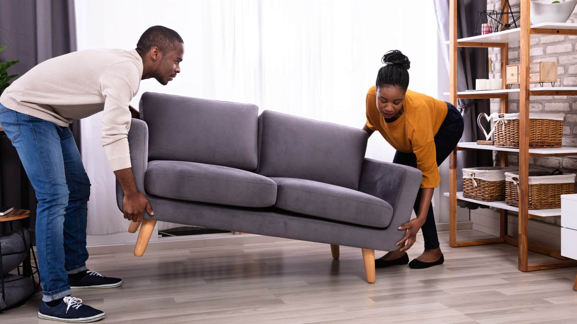 People carrying sofa