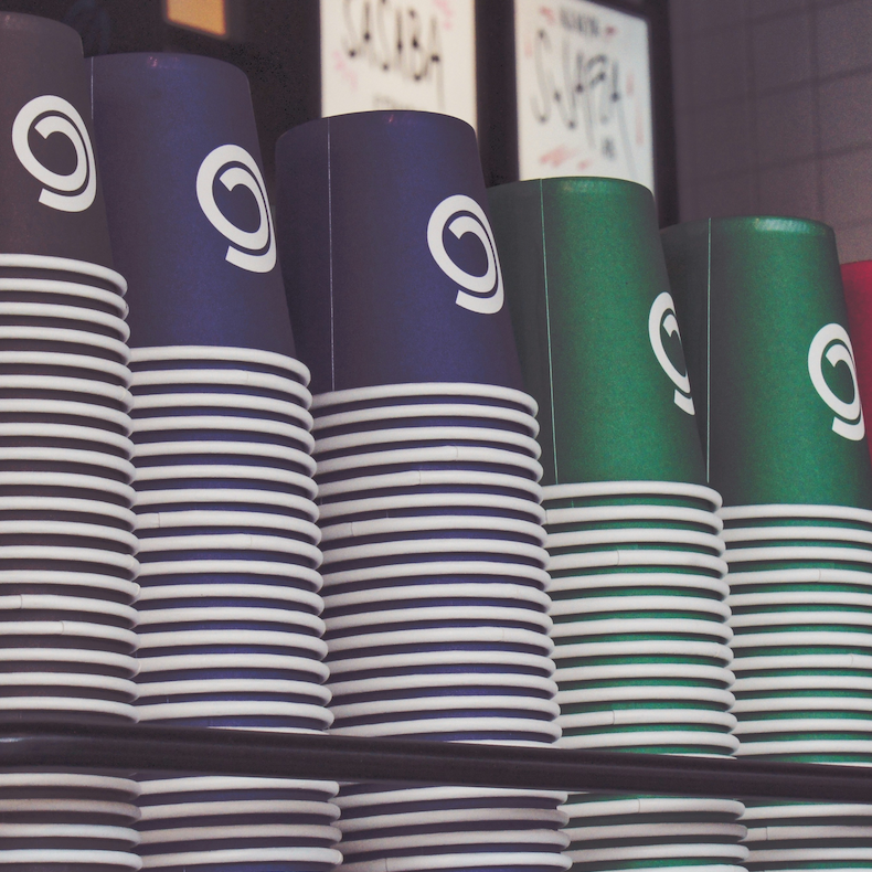 Stacks of multicoloured disposable cups