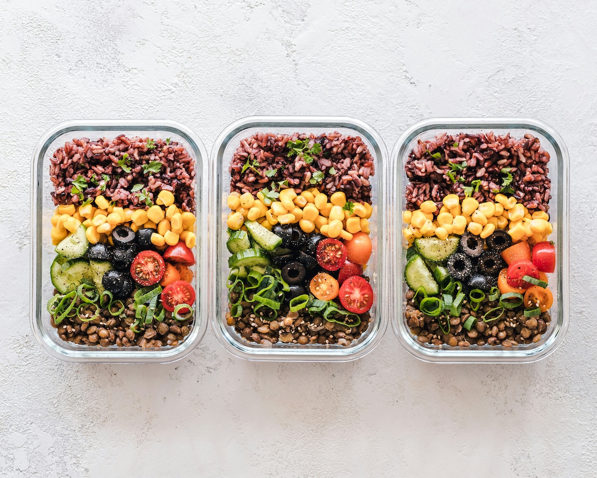 Reusable glass containers filled with leftover food 