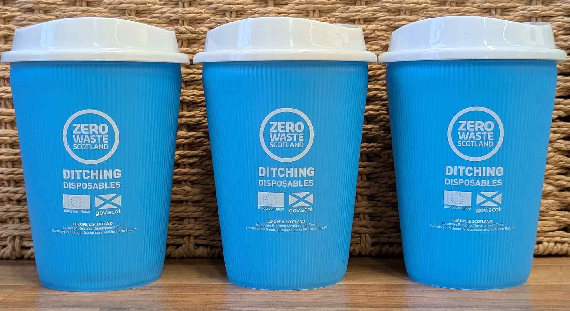 Photo of three reusable cups in a row with Zero Waste Scotland branding