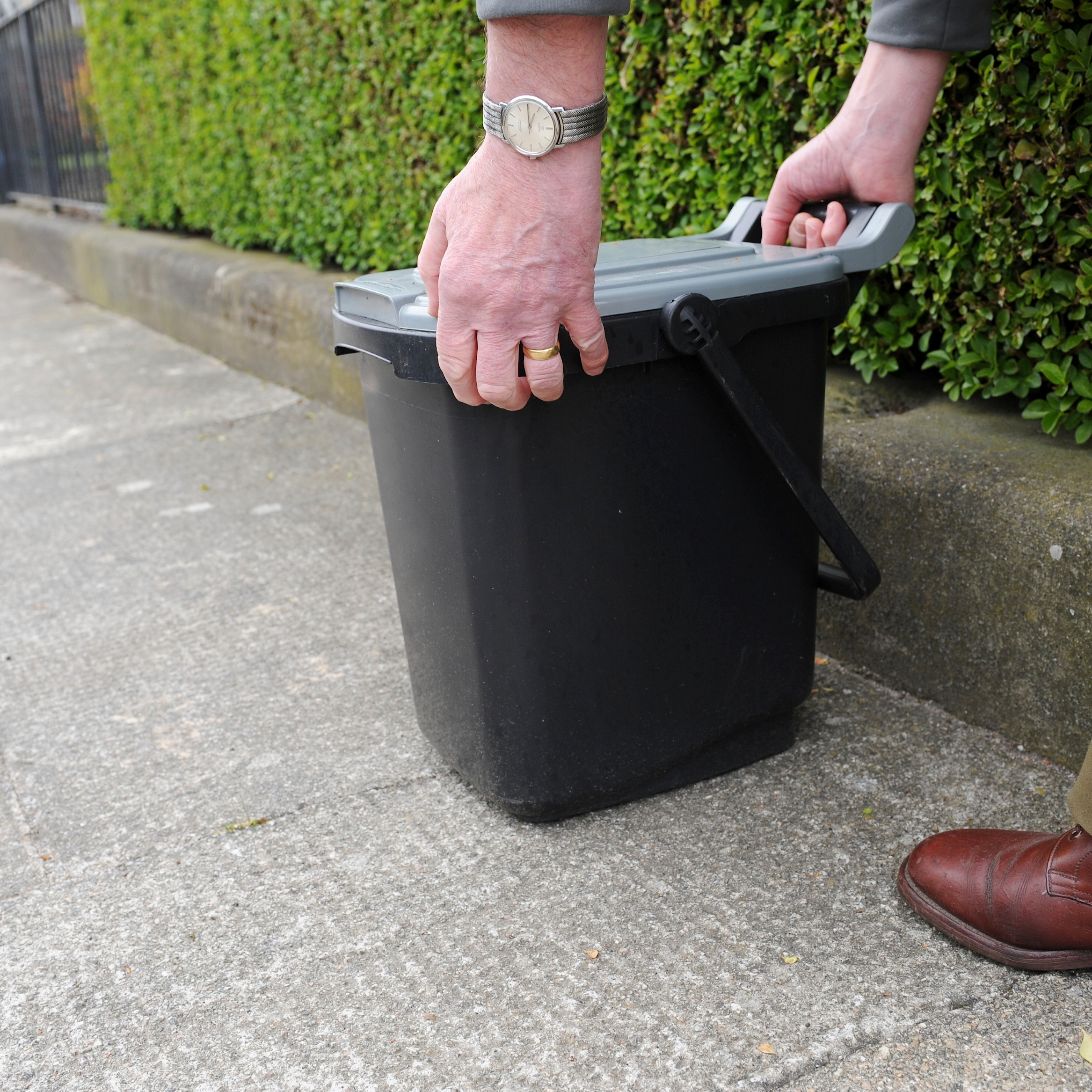 Kerbside food waste bin on a town pavement
