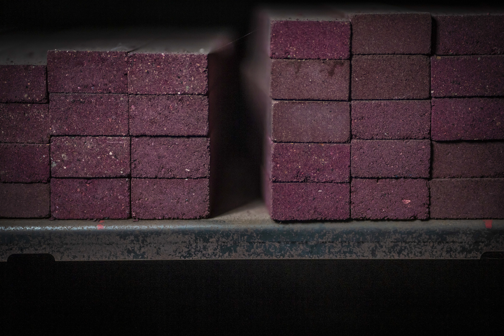 Stack of red remanufactured bricks